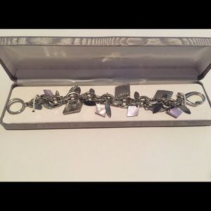 Silver And lavender chain linked bracelet